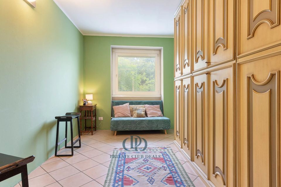 Splendida proprietà immersa nel verde con vista sul lago — 6