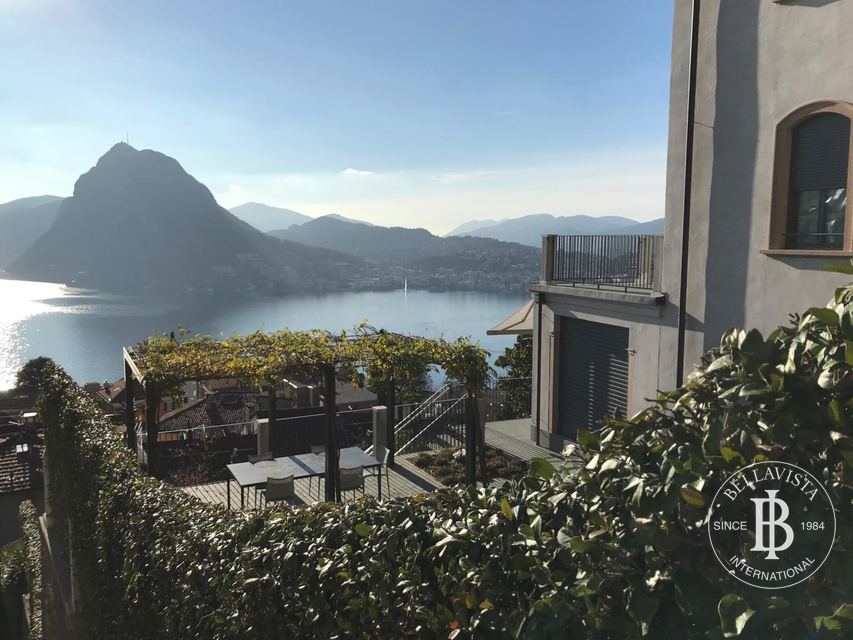 Villa with lake view and pool, Ruvigliana — 7.5 rooms — 9
